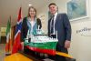 Her Excellency Ms Mari Skåre, the Norwegian Ambassador to Ireland and Dr Rick Officer, CEO of the Marine Institute with the model of the RV Tom Crean. Photo XPOSURE