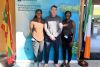 Kimberly Ince and Kavita Douglas with David O'Sullivan with Our Shared poster on the background